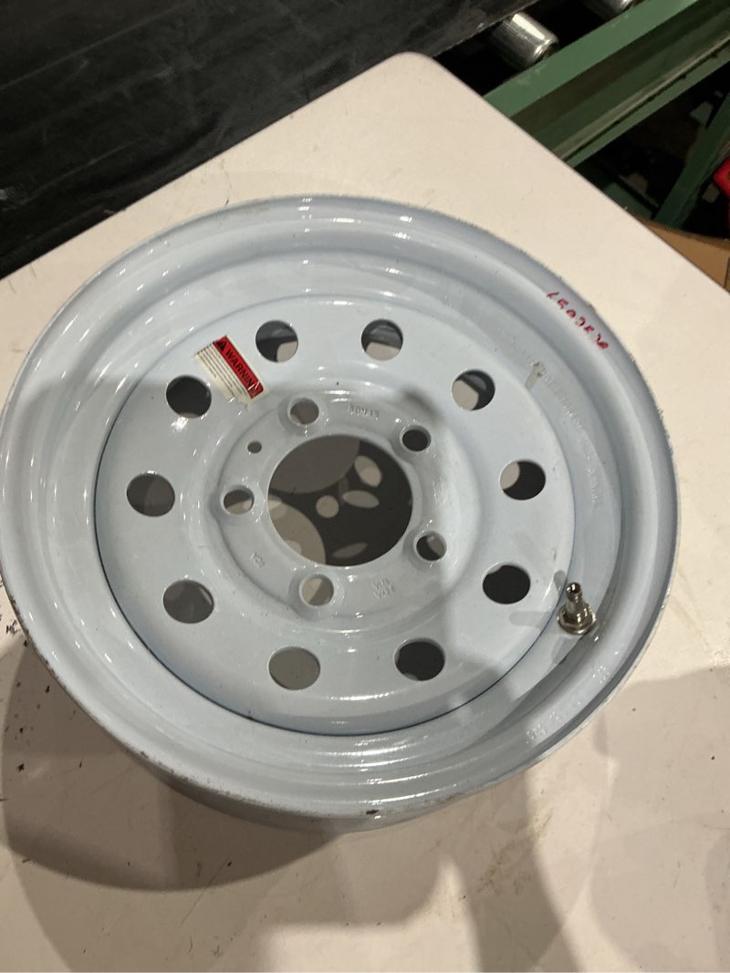 Condition photo showing As Is for sunbelt in front wheel for riding mower/tractor