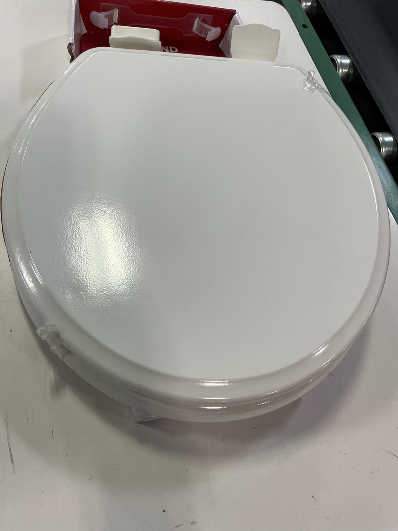 Condition photo showing As Is for american standard elongated slow close toilet seat in white moments ez clean am4