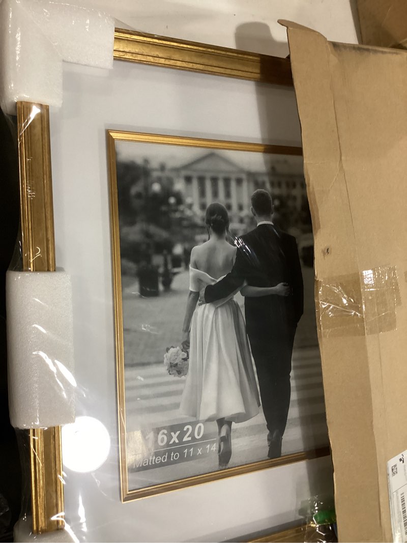 Condition photo showing New/Like New for Yaetm 16x20 Gold Picture Frame with Decorative Inner Frame & Tempered Glass, Display 11x14 Photos with Mat on Wall - Portrait or Landscape - Ideal for Office & Home Décor (Vintage Gold, Single) 16x20 - 1 pack Vintage Gold