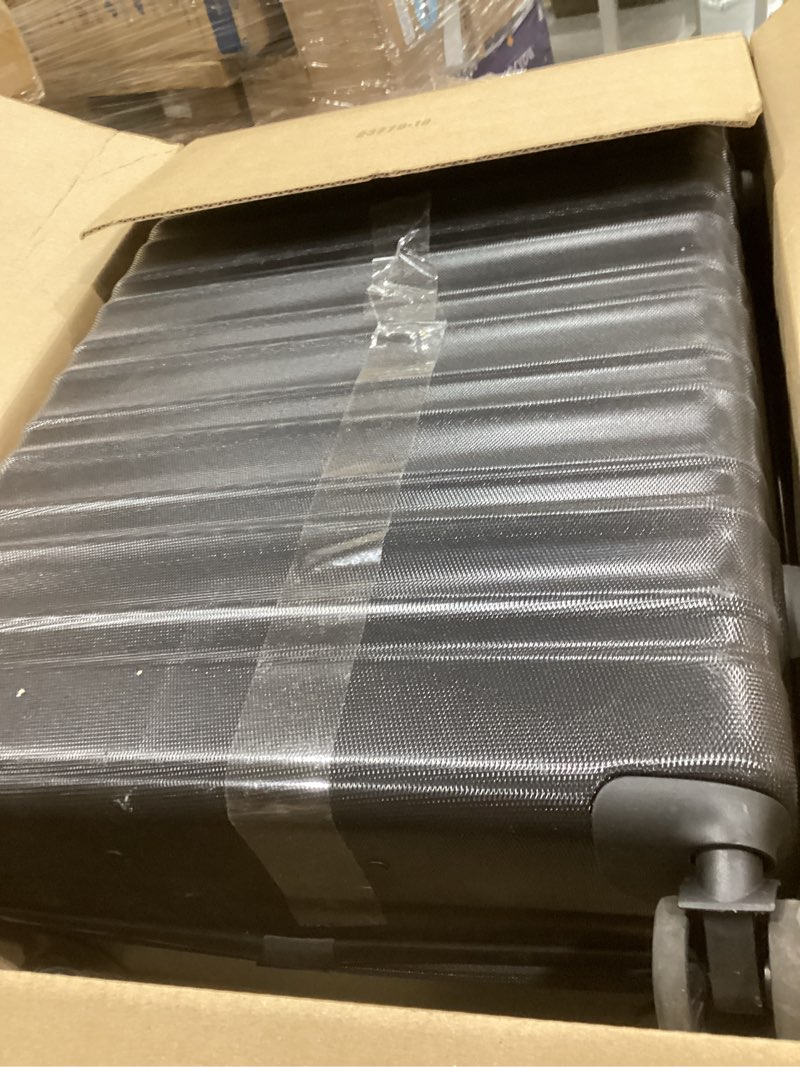 Condition photo showing Good Condition for amazon basics 30" hardside large checked luggage, hardshell suitcase with wheels, expandable for up to 15% more space, with scratch-resistant surface, four multi-directional wheels, black black large checked