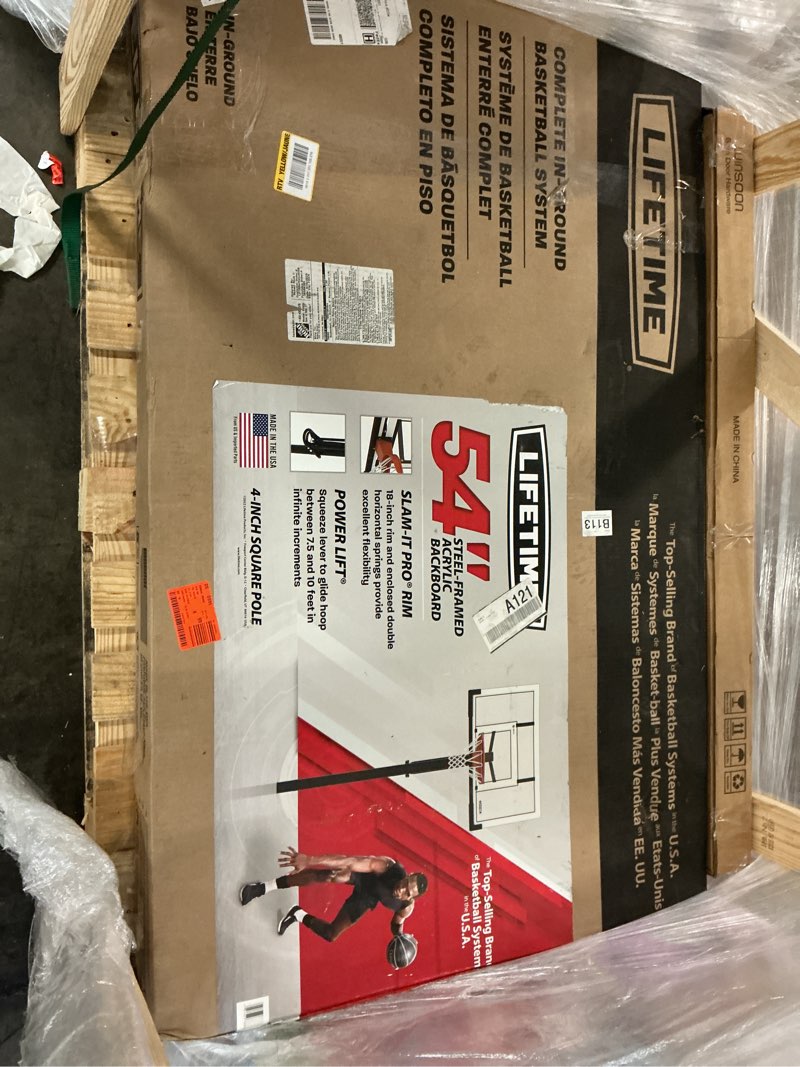 Condition photo showing New/Like New for 54 in. shatter guard power lift in-ground basketball system
