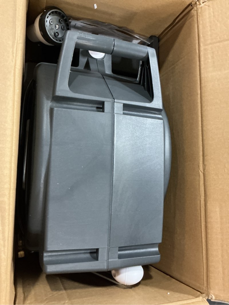 Condition photo showing New/Like New for retractable garden hose reel 1/2 in x82 ft, garden water hose reel with 7- function sprayer nozzle, any length lock/automatic slow return system,180° swivel bracket gray-white 1/2" 82ft