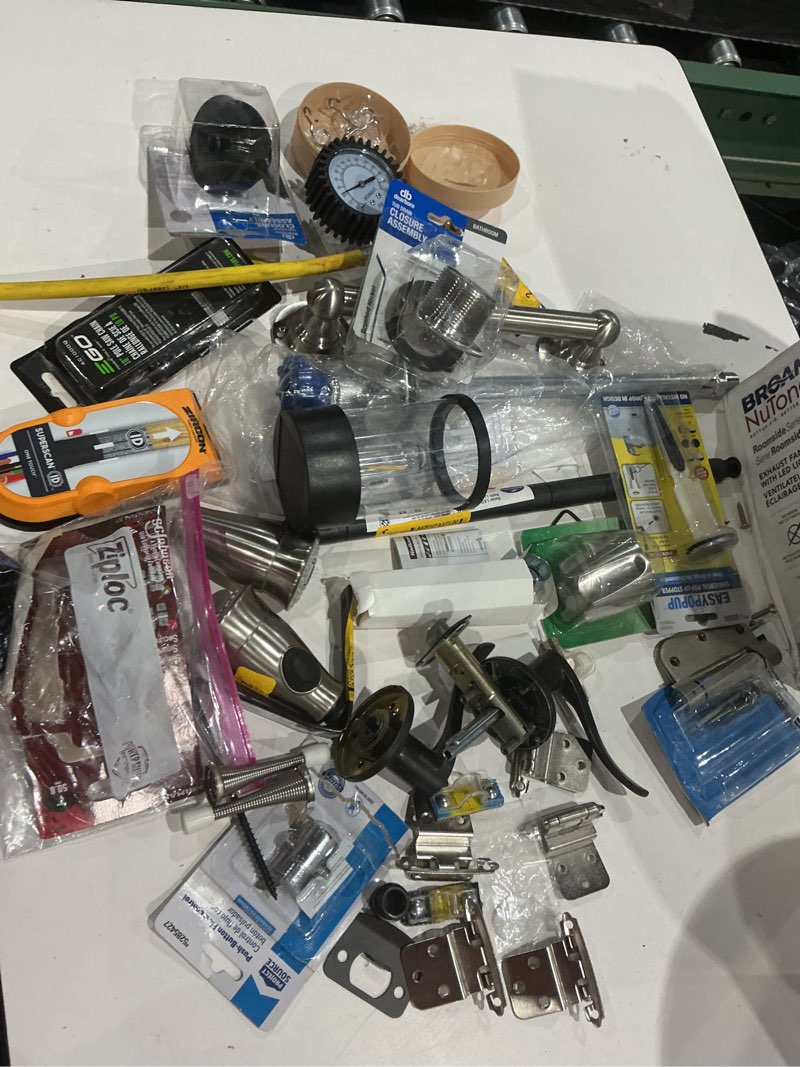 Condition photo showing As Is for assorted home improvement lot (small tools, screw, home accessories, etc.)