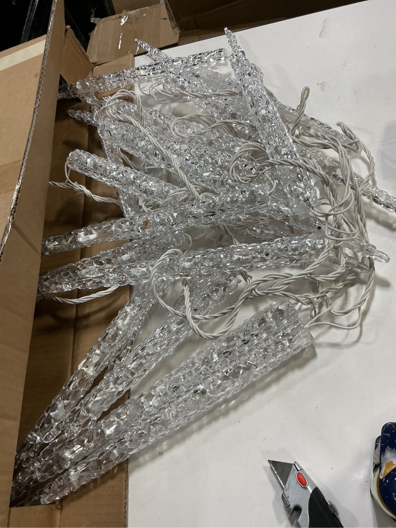 Condition photo showing As Is for Joomer Blue Christmas Icicle Lights, 13FT 20 Tubes 90 LED 8 Modes Icicle Lights with Timer Function, Waterproof Connectable Ice String Lights for Holiday Home Patio Trees Christmas Decoration Blue 90LED