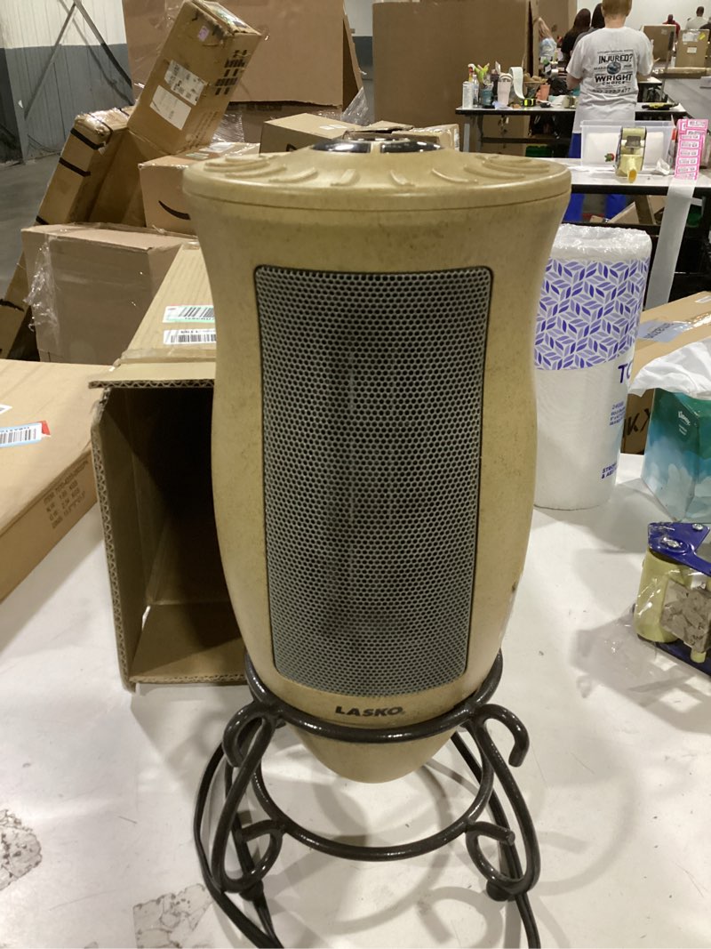 Condition photo showing As Is for lasko oscillating designer ceramic tower space heater for home with adjustable thermostat, timer and remote control, 16 inches, 1500w, 6435