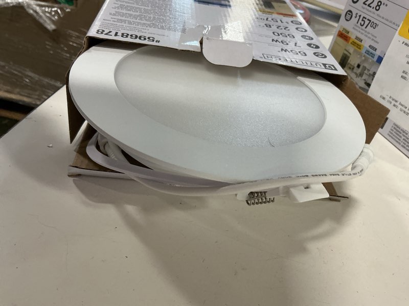 Condition photo showing As Is for  Utilitech White 6-in 650 -Lumens Switchable white Round Dimmable LED Canless Wet rated Recessed
