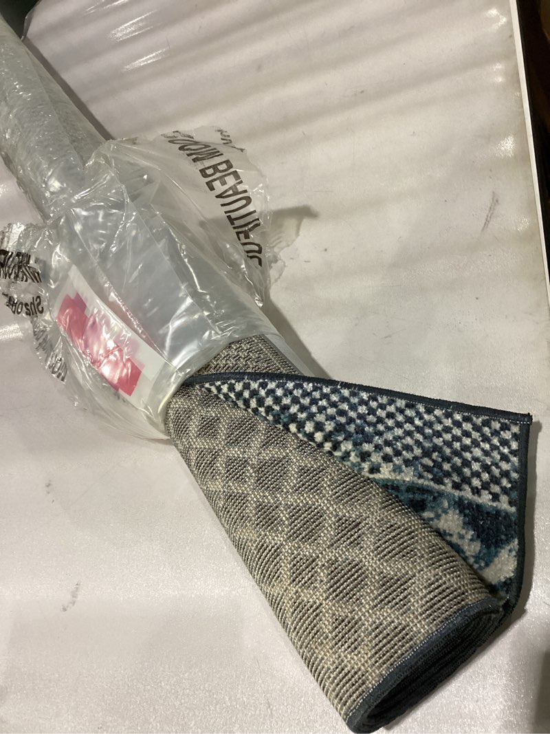 Condition photo showing New/Like New for nuLOOM Ginnie Machine Washable Moroccan Tribal Area Rug, 4x6, Blue Ginnie Blue 4' x 6' (Rectangular)