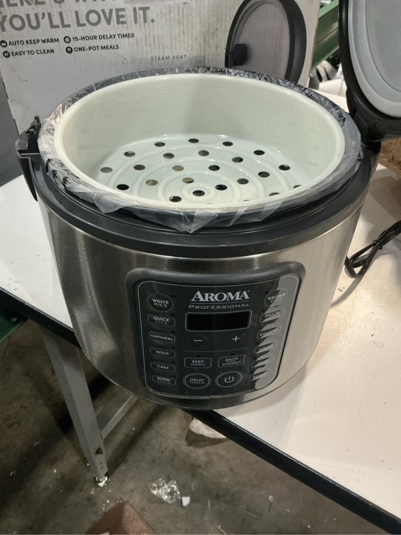Condition photo showing item condition for AROMA Professional Digital Rice Cooker, 10-Cup (Uncooked) / 20-Cup (Cooked), Multicooker, Slow Cooker, Steamer, Oatmeal Cooker, Egg Cooker, STS, 5 Qt, Gray, ARC-5200SG 10 Cup Uncooked / 20 Cup Cooked