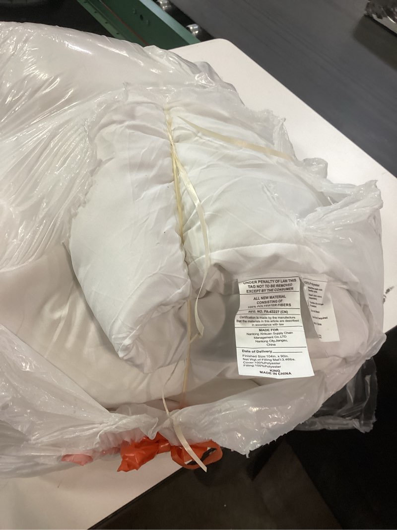Condition photo showing As Is for White cotton comforter, king size