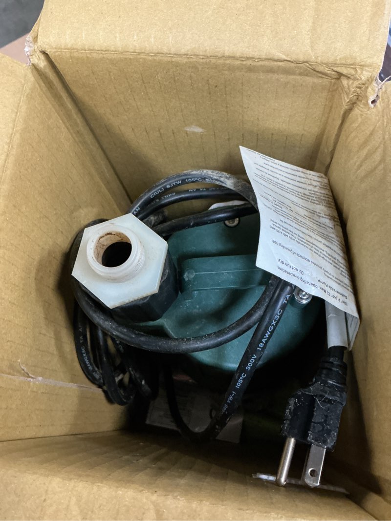 Condition photo showing As Is for zoeller 1/3 hp 2100 gph thermoplastic electronic switch bottom ac submersible utility pump
