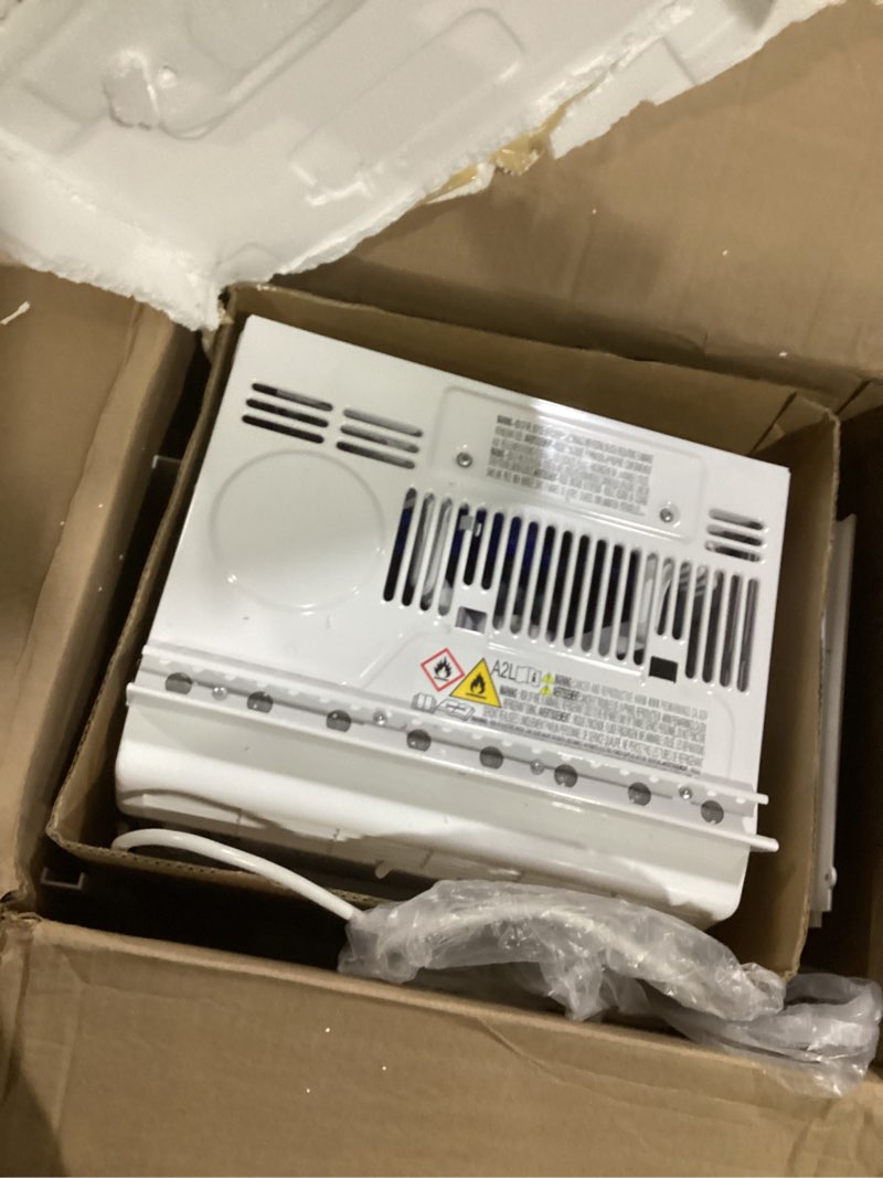 Condition photo showing As Is for amazon basics 5000-btu window air conditioner with quiet operation, up to 150 sqf, cool and fan functions, washable filter, adjustable window kit, intuitive mechanical controls, for small room, white white 5000 btu