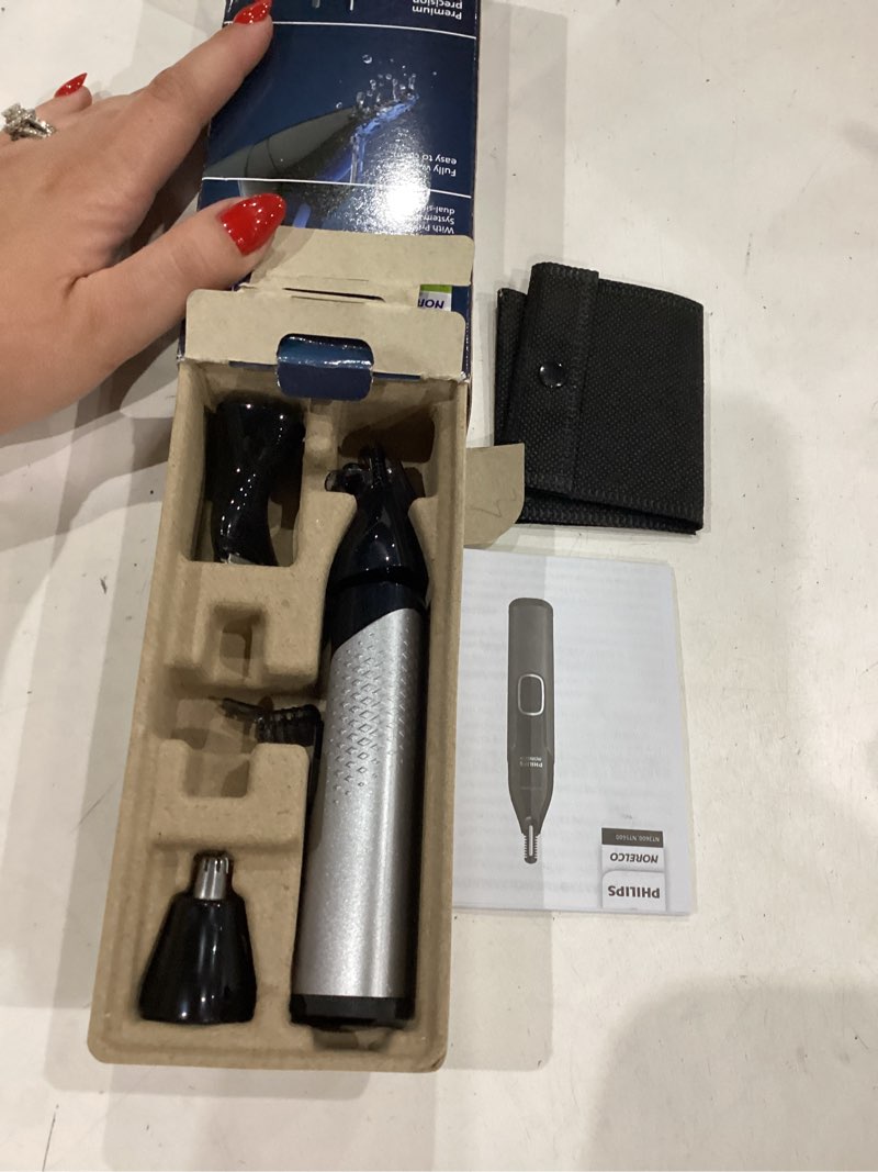 Condition photo showing As Is for norelco philips nose trimmer 5000 for nose, ears, eyebrows trimming kit, nt5600/62 black, silver 7.9 inch (pack of 1)