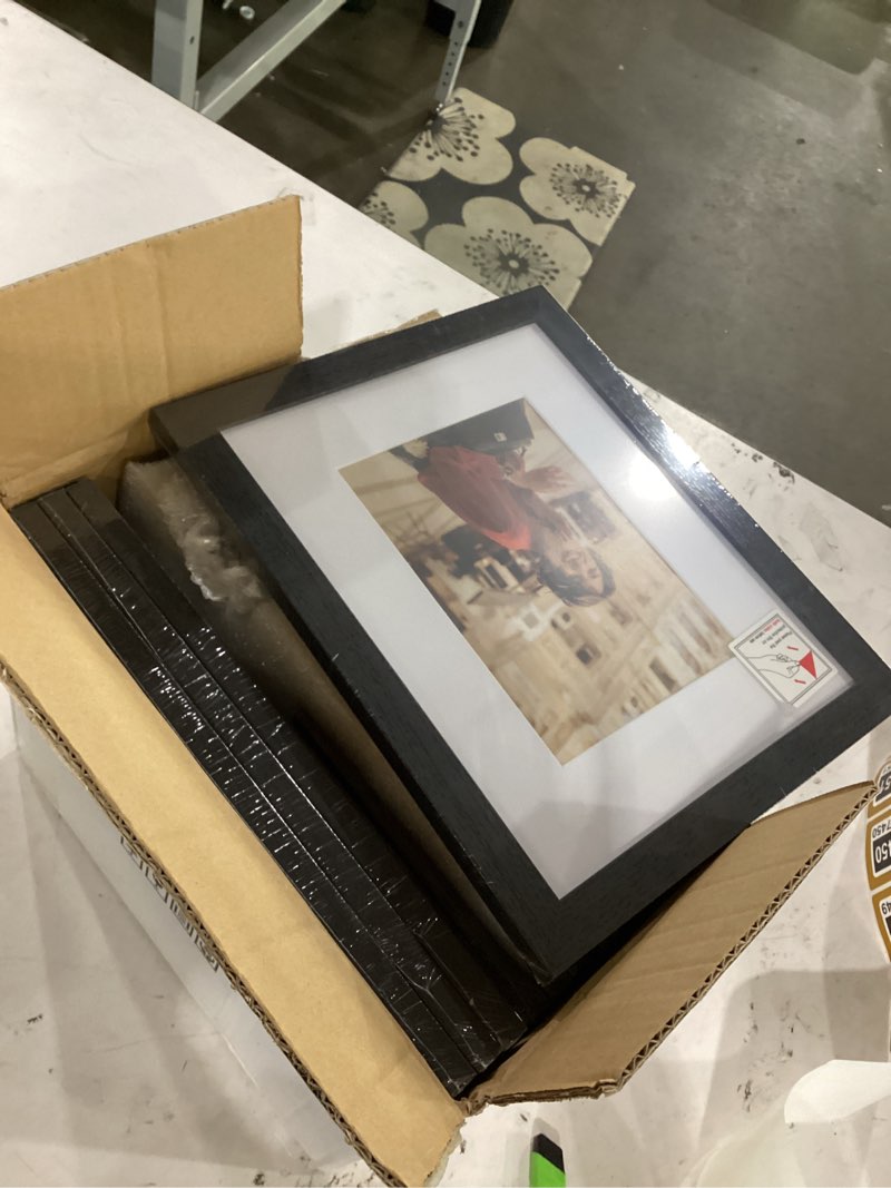 Condition photo showing Good Condition for vittanly 20 pack picture frames collage wall decor, multi sizes including 4pcs 8x10, 8pcs 5x7 and 8pcs 4x6 photo frames, gallery frame set for wall or tabletop display, black, brown and dark grey black & brown & dark grey