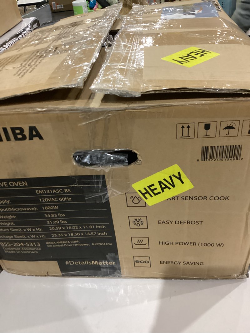 Condition photo showing As Is for TOSHIBA EM131A5C-BS Countertop Microwave Ovens 1.2 Cu Ft, 12.4" Removable Turntable Smart Humidity Sensor 12 Auto Menus Mute Function ECO Mode Easy Clean Interior Black Color 1000W 1.2 Cu.ft