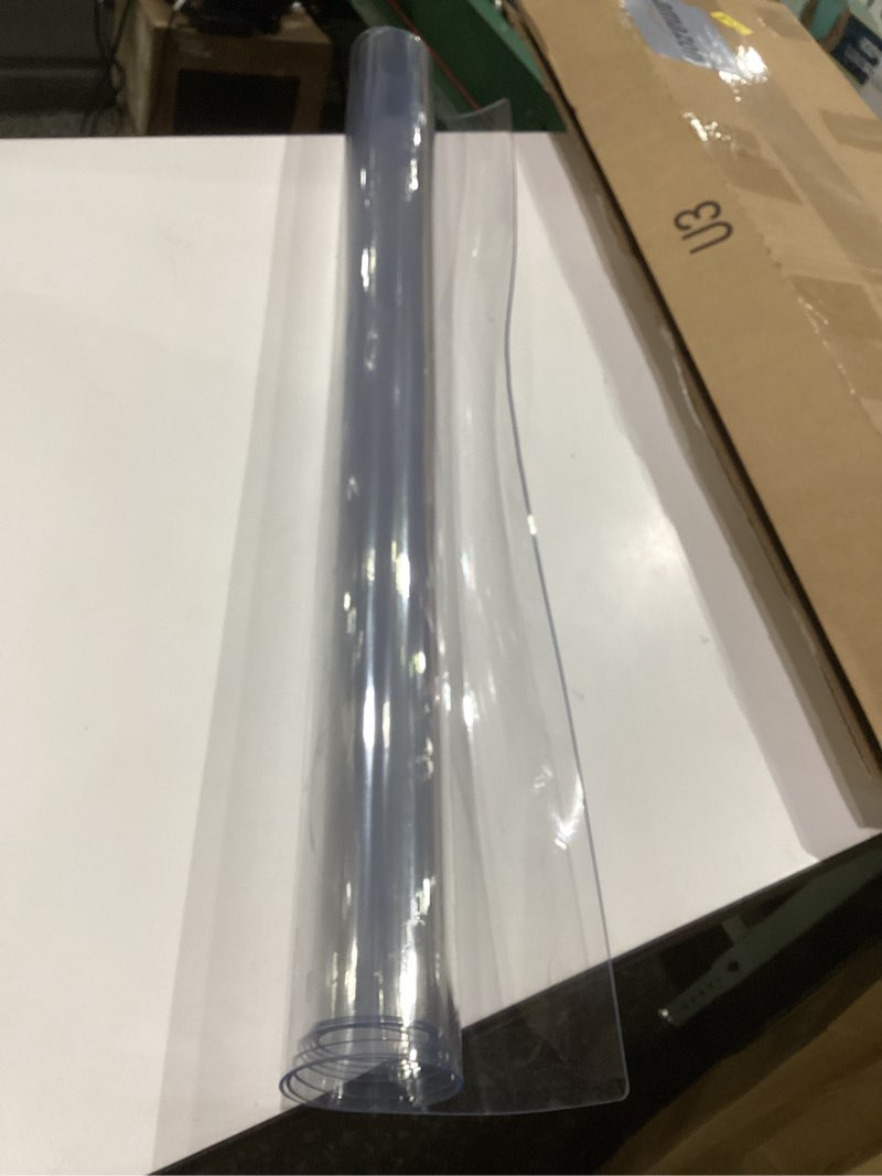 Condition photo showing As Is for royhom clear table protector 36 x 60 inch - 2mm thick plastic table cover, clear table cover protector rectangle, waterproof pvc desk mat for coffee table, writing desk, dining room, dresser 36" x 60" (rectangular) clear 2mm