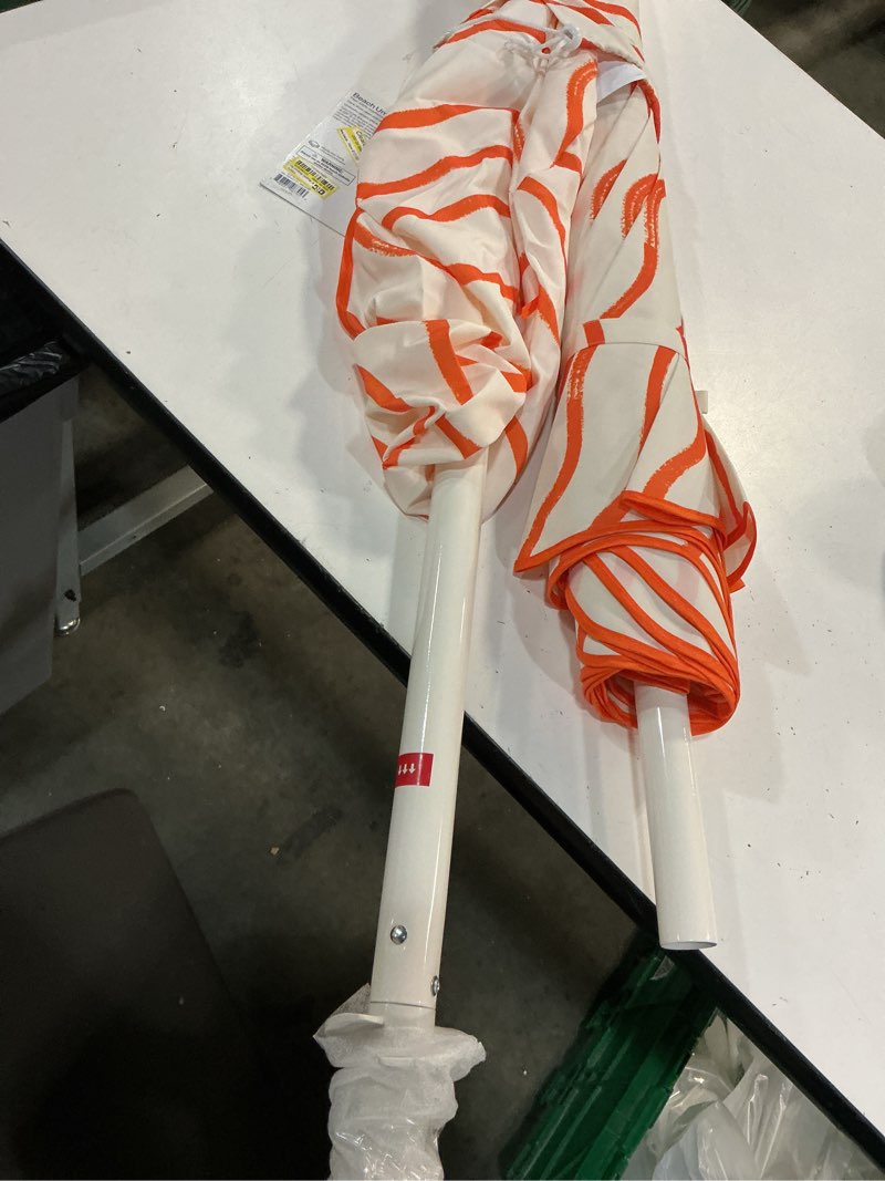 Condition photo showing Good Condition for 6' round outdoor patio striped beach umbrella orange - room essentials ?