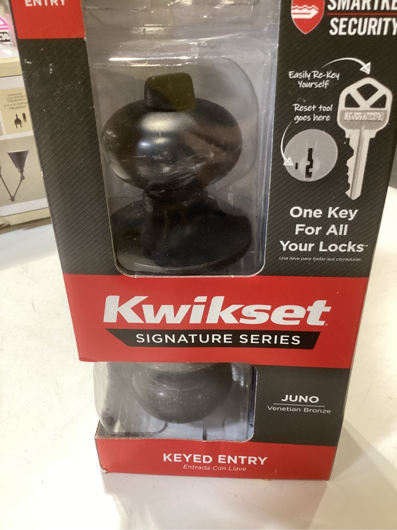 Condition photo showing As Is for kwikset smartkey juno venetian bronze entry door knob kw1 1-3/4 in.