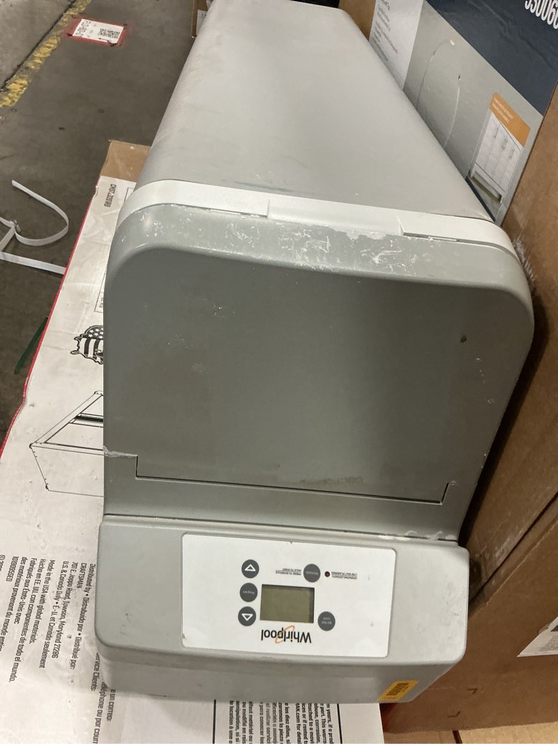 Condition photo showing As Is for 44,000 grain water softener system