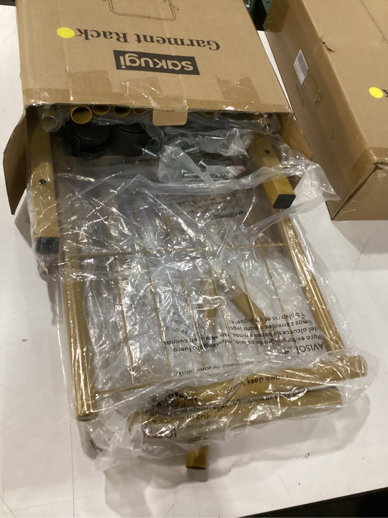 Condition photo showing Good Condition for clothes rack - metal coat rack with bottom shelf, portable wardrobe rack with 6 side rods, rolling clothing rack for hanging clothes for bedroom or laundry room (gold, 28.7 x 17 x 59.4) gold 28.7" x 17" x 59.4"