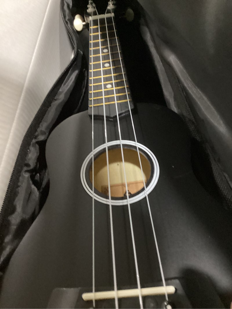 Condition photo showing As Is for Soprano Ukulele Beginner Pack, 21 Inch Basswood kids Ukuleles Starter Kit with Gig Bag Digital Tuner Spare Strings and Picks. (black) 21 inch black