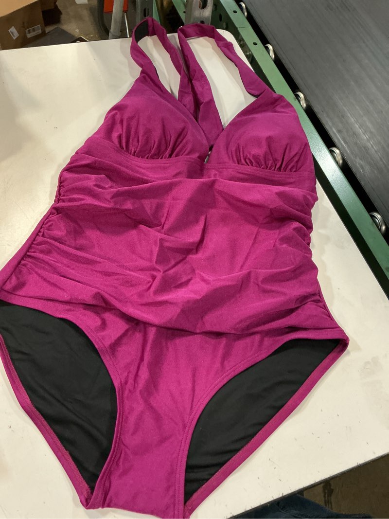Condition photo showing New/Like New for dkny pink one-piece swimsuit with gathered belly support,size l