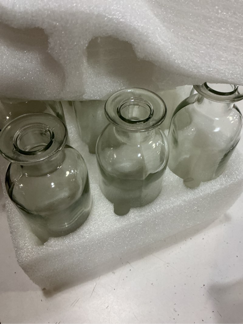 Condition photo showing New/Like New for peohud set of 12 glass bud vases, clear small flower vases, decorative glass bottles floral vases for home decor, wedding reception, party