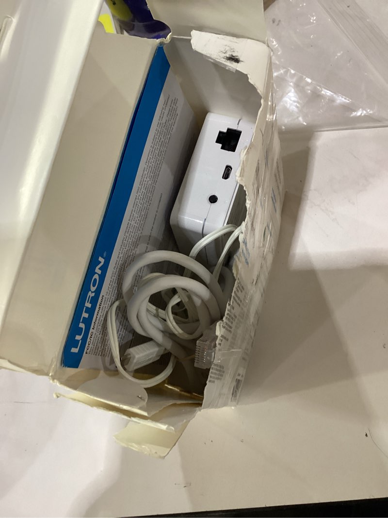 Condition photo showing As Is for Lutron Caseta Smart Lighting Smart Hub for Light Bulbs and Fans, Compatible w/ Amazon Alexa, Apple Homekit, Google Home, 75 Device Capacity, L-BDG2-WH, White