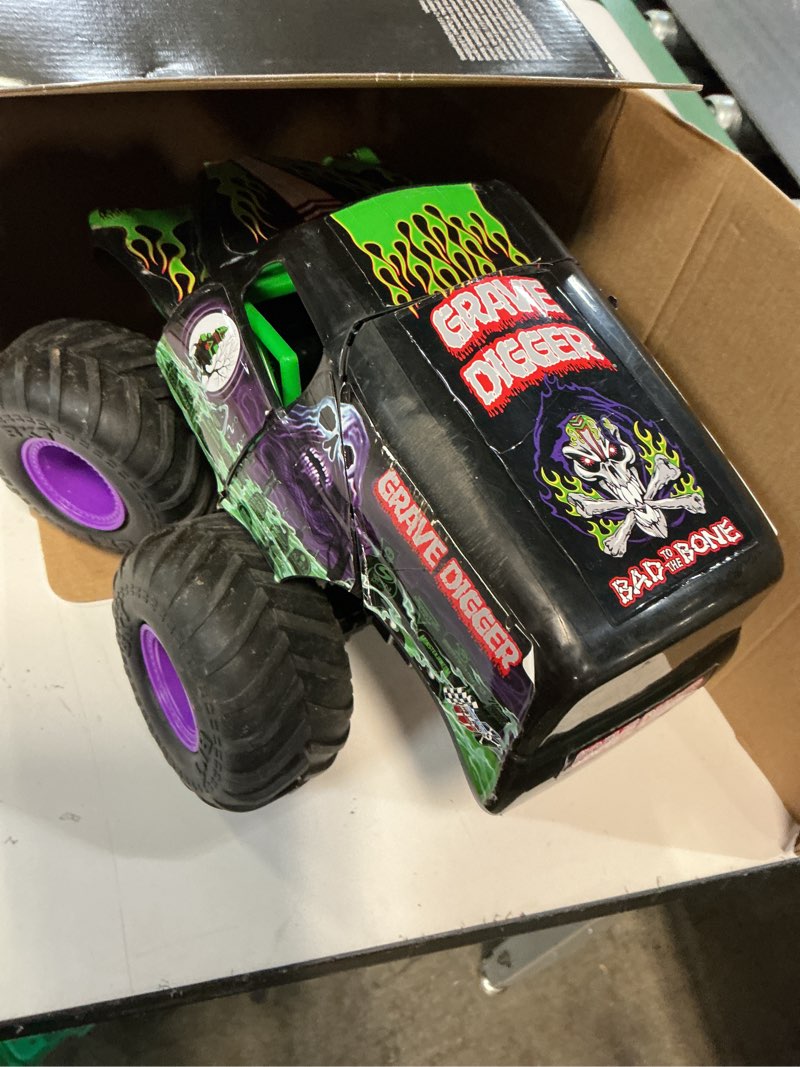 Condition photo showing As Is for monster jam, official smash & bash grave digger remote control indoor & outdoor vehicle, 1:15 scale repairable monster truck, kids toys for boy and girls ages 4 and up smash & bash grave digger 1:15 rc