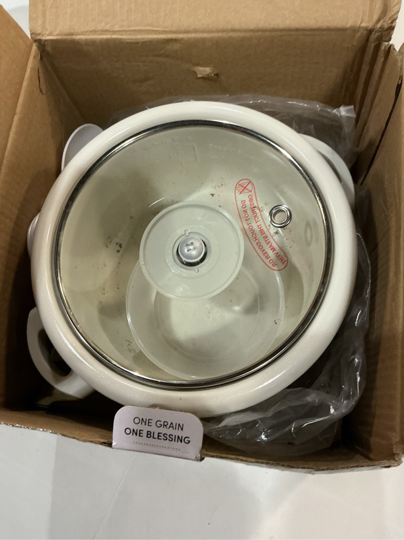 Condition photo showing As Is for aroma® mini rice cooker, 2-cup (uncooked) / 4-cup (cooked), grain cooker, soup maker, oatmeal cooker, auto keep warm, 1 qt, milk tea color