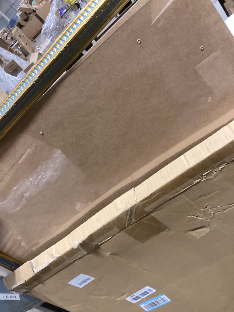 Condition photo showing As Is for GULETHUN 24x36 Picture Frame Gold - Vintage Photo Frame 24 by 36, Retro Home Decor Wall Hanging Gallery Frames, Sturdy, Plexiglass, Ornate Gold Raised Poster Frame for Vertical & Horizontal Display Gold 24x36in