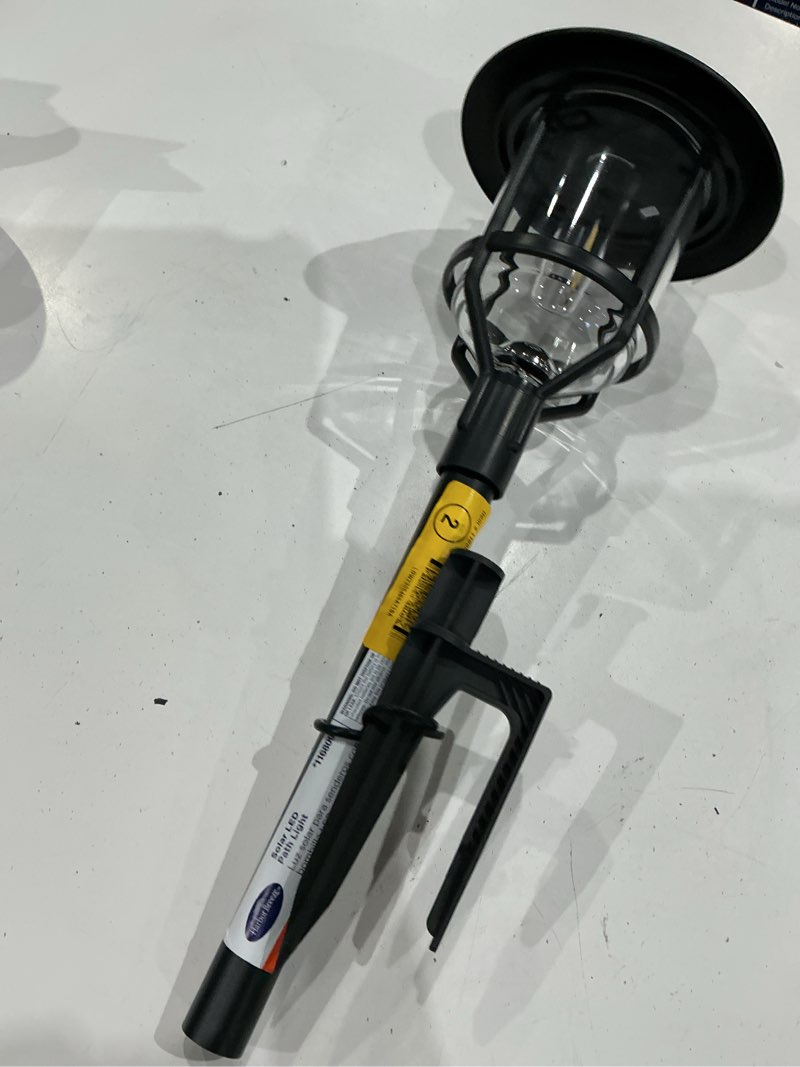 Condition photo showing As Is for harbor breeze path light 15 -lumens 0.2 -watt black solar led outdoor path light ( 3000-k )