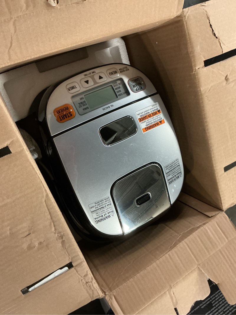 Condition photo showing As Is for Zojirushi 612252-NL-BAC05SB Micom Rice Cooker and Warmer, Silver Black
