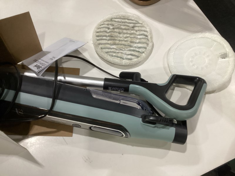 Condition photo showing As Is for shark steam & scrub steam mop, all-in-one scrubbing and sanitizing hard floor cleaner, led headlights, 4 dirt grip soft scrub pads included, xl water tank, swivel steering, hawaiian grey, s8001 steam & scrub (4-pad), not tested, used