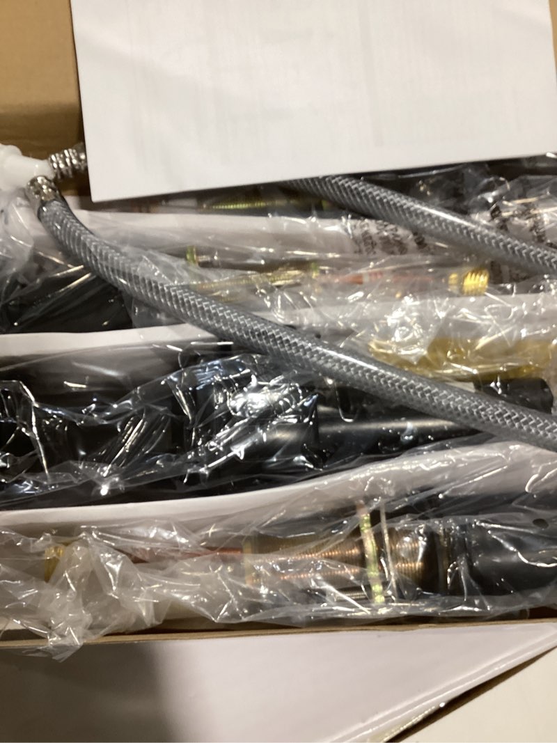 Condition photo showing New/Like New for  allen + roth veda matte black widespread 2-handle watersense high-arc residential handle