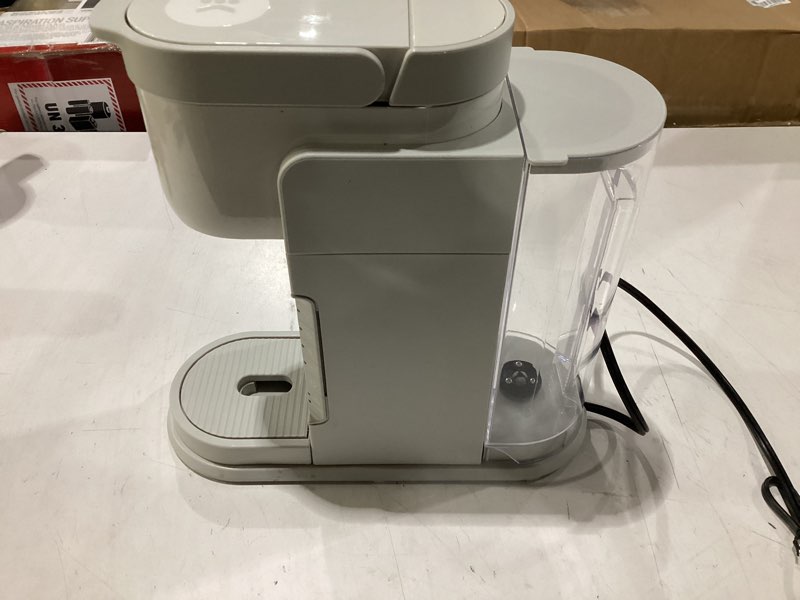 Condition photo showing As Is for **untested** keurig k-express single serve k-cup pod coffee maker, 3 brew sizes, strong button feature, 42oz removable reservoir, warm stone