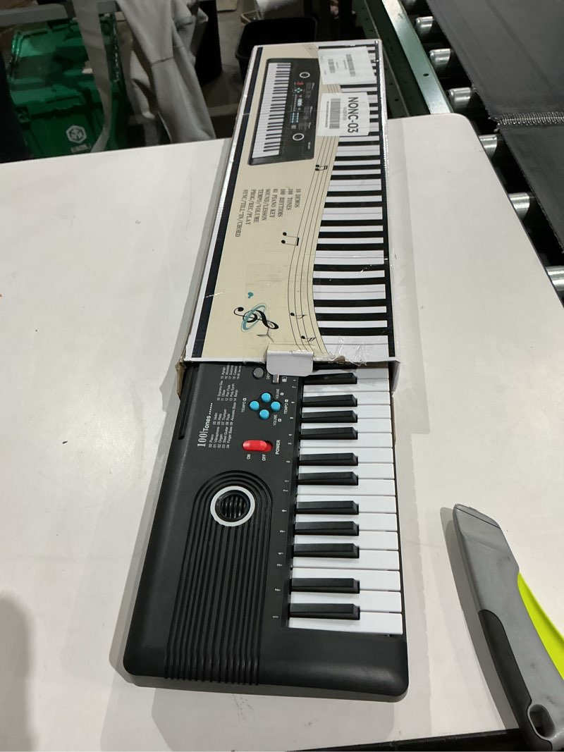 Condition photo showing Good Condition for costzon 61 key keyboard piano, electric digital piano keyboard with microphone, music stand, keynote stickers & carrying bag, portable keyboard piano for beginners adults