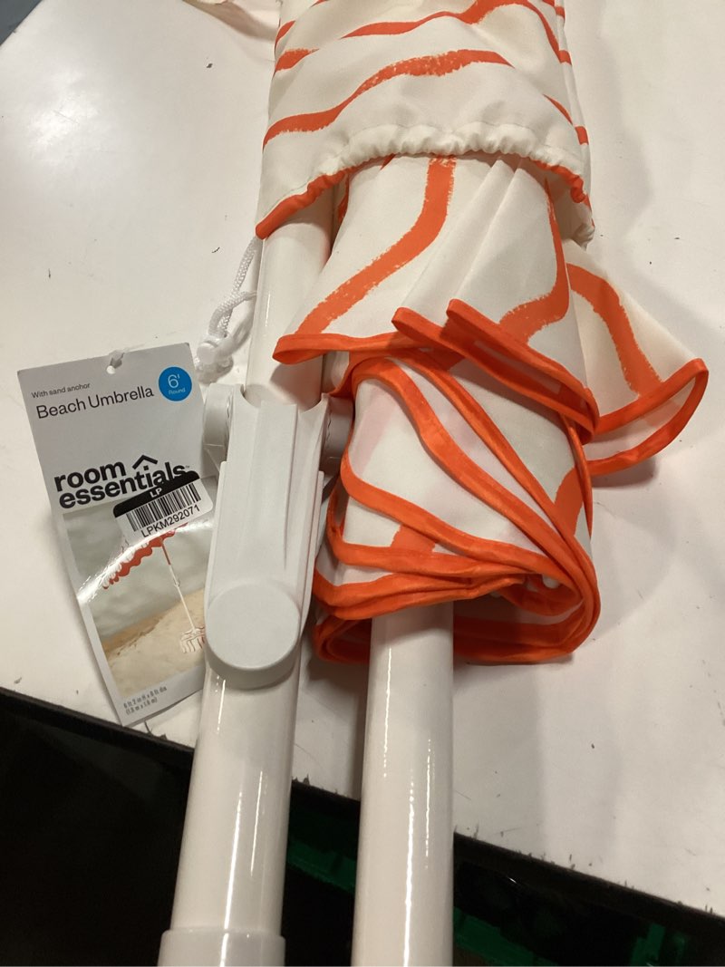 Condition photo showing New/Like New for 6' round outdoor patio striped beach umbrella orange - room essentials ?