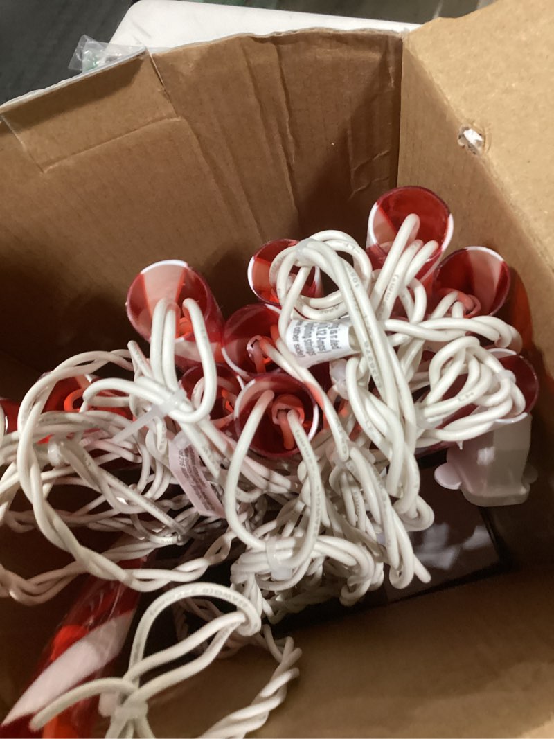 Condition photo showing As Is for Joiedomi 12 Pcs Christmas Candy Cane Pathway Markers Lights, 16” Stakes Lights with Warm White, Waterproof Outdoor Decorations for Xmas Indoor and Outdoor Decorations Yard, Walkway, Lawn, Garden Warm Light 16 inch