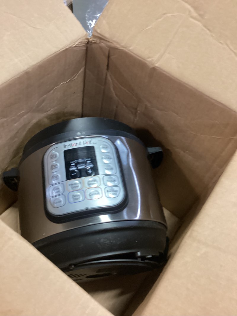 Condition photo showing As Is for instant pot duo 7-in-1 electric pressure cooker, slow cooker, rice, steamer, sauté, yogurt maker, warmer & sterilizer, includes app with over 800 recipes, stainless steel, 6 quart 6 quarts