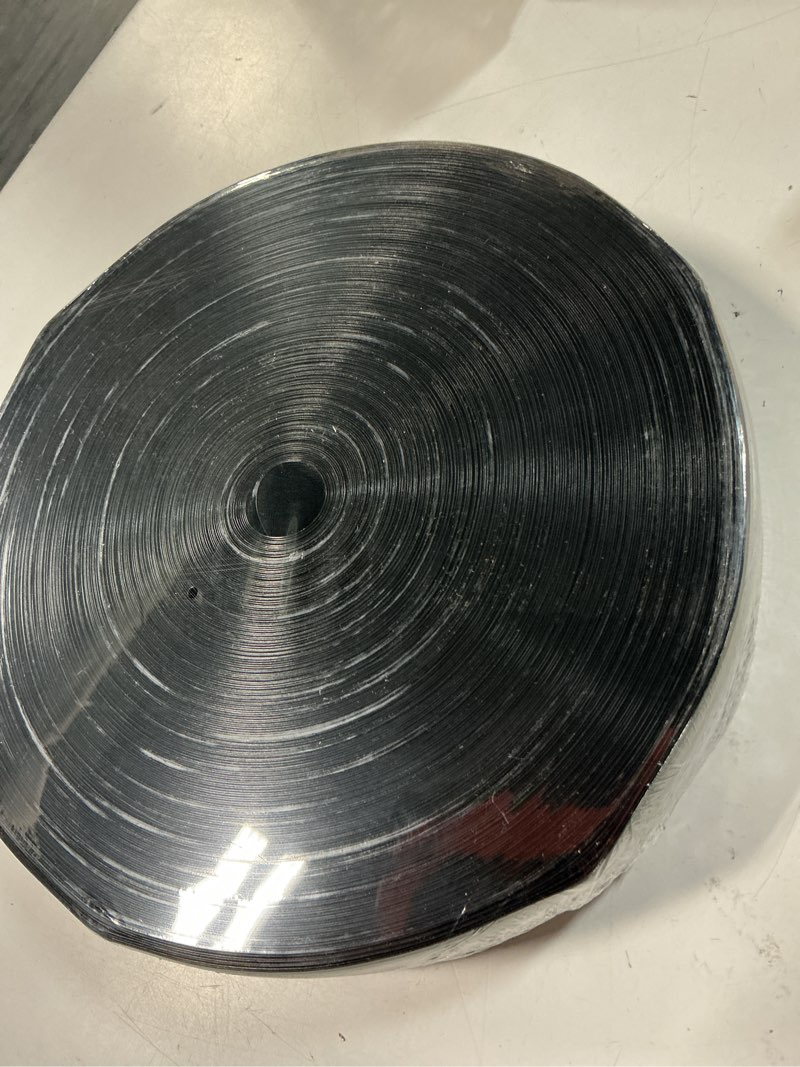 Condition photo showing New/Like New for chain link fence privacy strip, 246 ft. fence privacy strip, (includes 200 clasps + one hole punch) black?suitable for decks, patios,grates, wire mesh and more. 246 ft. black