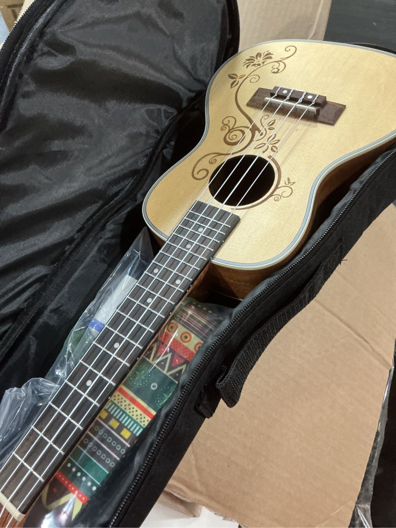 Condition photo showing New/Like New for concert ukulele 23 inch spruce flower top sapele professional ukuleles for beginners with bag, digital tuner, strap, 4 strings set, pick, cleaning cloth concert spruce flower carved concert