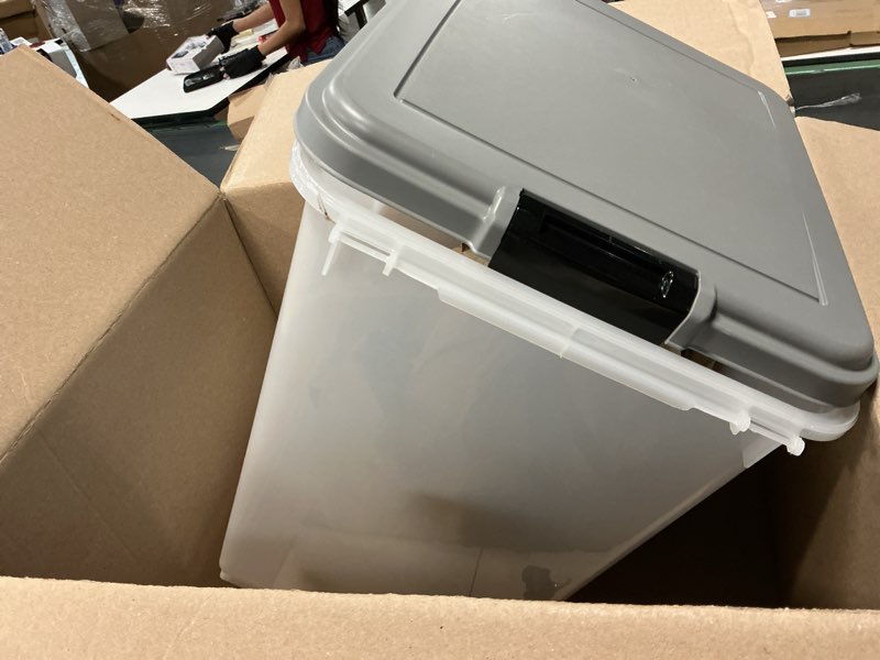 Condition photo showing As Is for amazon basics airtight pet food storage container with scoop, bpa free, removable wheels, 69 qt, gray