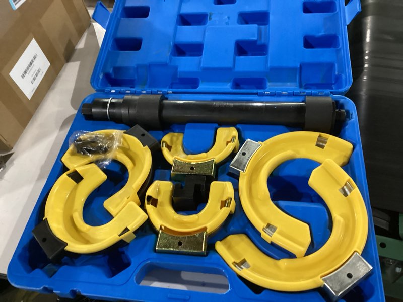 Condition photo showing New/Like New for macpherson strut spring compressor kit, heavy duty interchangeable fork coil extractor tool set for auto suspension repair, includes 3 pairs of jaws (65-212mm) with carrying case (manual use only)