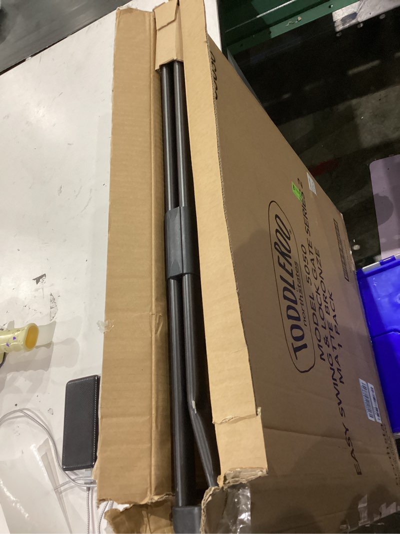 Condition photo showing As Is for Toddleroo by North States - Tall Easy Swing & Lock Baby Gate Series 2: Metal Safety Gate for Stairs & Doorways - Adjustable 28.68 to 47.85 Inches Wide - 36 Inches Tall - black