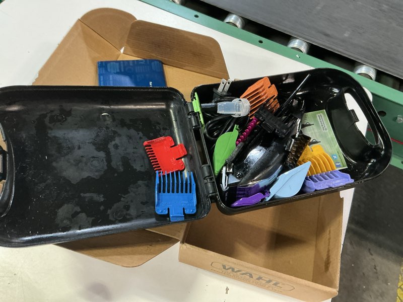 Condition photo showing As Is for wahl home haircutting corded clipper kit with adjustable taper lever, and 10 color coded guards for easy clipping & trimming - model 79722 20 piece set