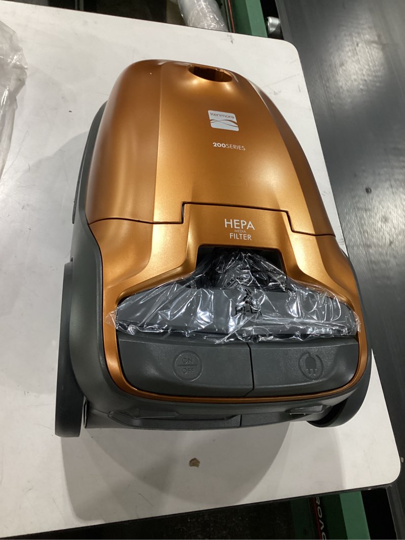 Condition photo showing Good Condition for **untested** kenmore 81214 200 series pet friendly lightweight bagged canister vacuum with hepa, 2 motor system, and 3 cleaning tools-orange kenmore 200 series + hepa + 2 motor system