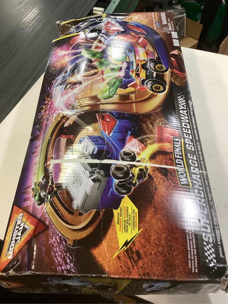 Condition photo showing As Is for monster jam, supercharge speedway playset, megalodon and el toro loco die-cast monster trucks, light up world finals track kids toys for boys ages 3 and up