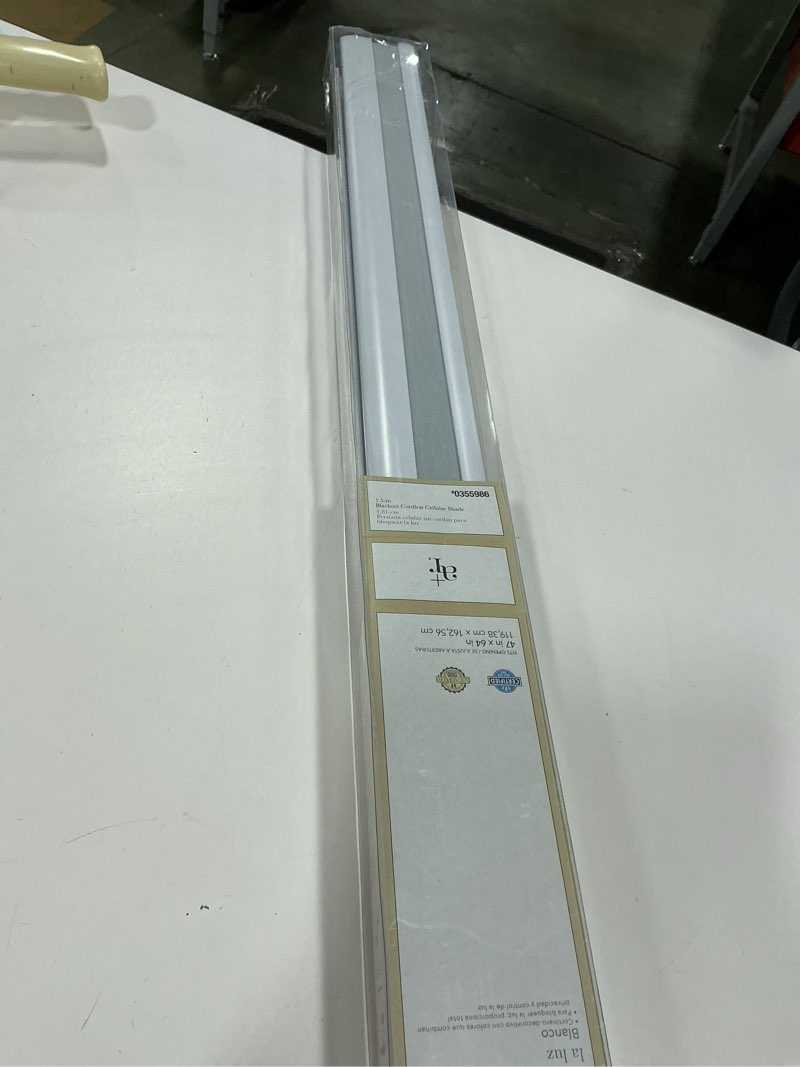 Condition photo showing New/Like New for allen + roth 47-in x 64-in White Blackout Cordless Cellular Shade