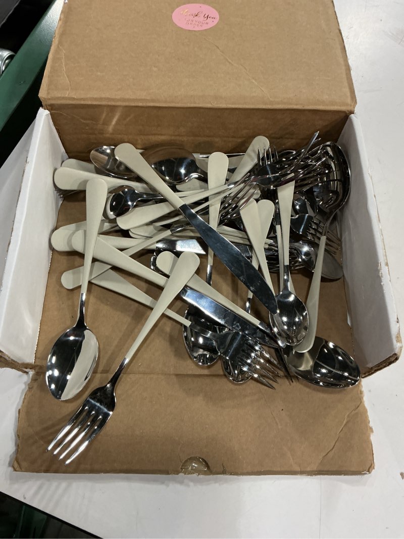 Condition photo showing Good Condition for 20-piece off white silverware set, 18/0 stainless steel off white handle flatware set, service for 4, modern cutlery set includes dinner knives forks spoons,mirror polished,dishwasher safe off white-20piece