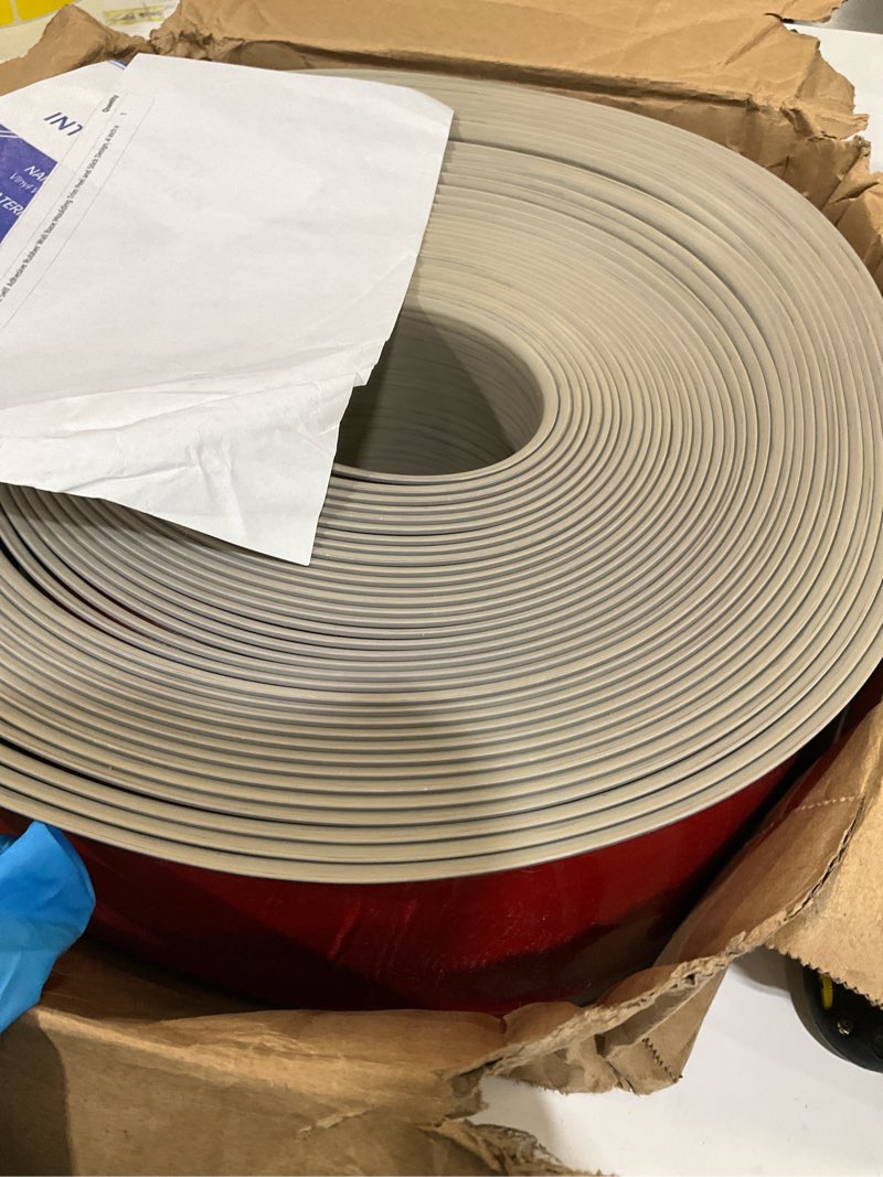 Condition photo showing As Is for FONUNO Vinyl Wall Base Baseboard Molding Trim 4" Flexible Self Adhesive Rubber Wall Base Moulding Trim Peel and Stick Design, 4 Inch x 60 Feet, Medium Grey Wood Grain